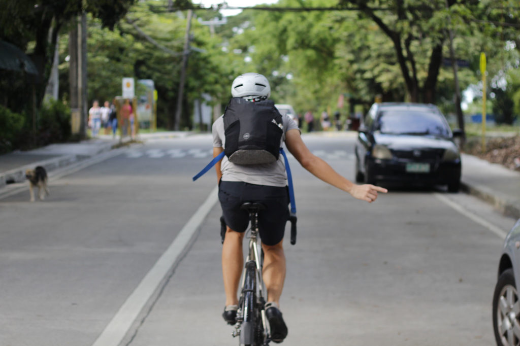 Turning right cycling hand signal