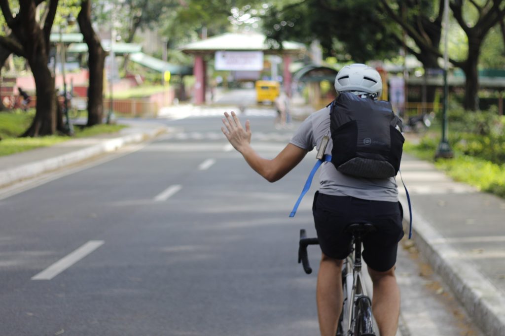 Go ahead cycling hand signal