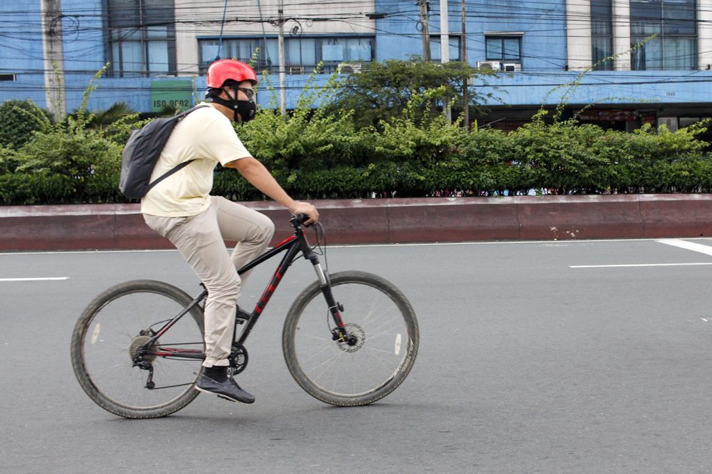 A bike commuter at Aurora Boulevard